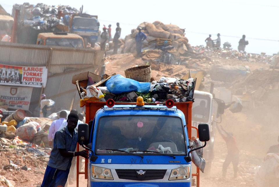 Image: Three and four wheeler vehicles transporting waste to dispose in an open dumpsite in Accra, Ghana; Photo: Seth