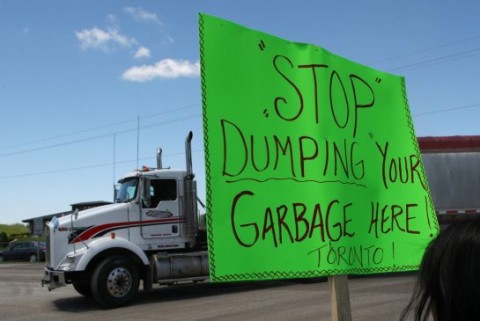 Few other issues have the potential to generate street protests from residents than announcing a planned landfill or other waste disposal facility; Image: Residents of Southwold Township protesting against landfilling Toronto's waste in their backyard; Source: thestar.com